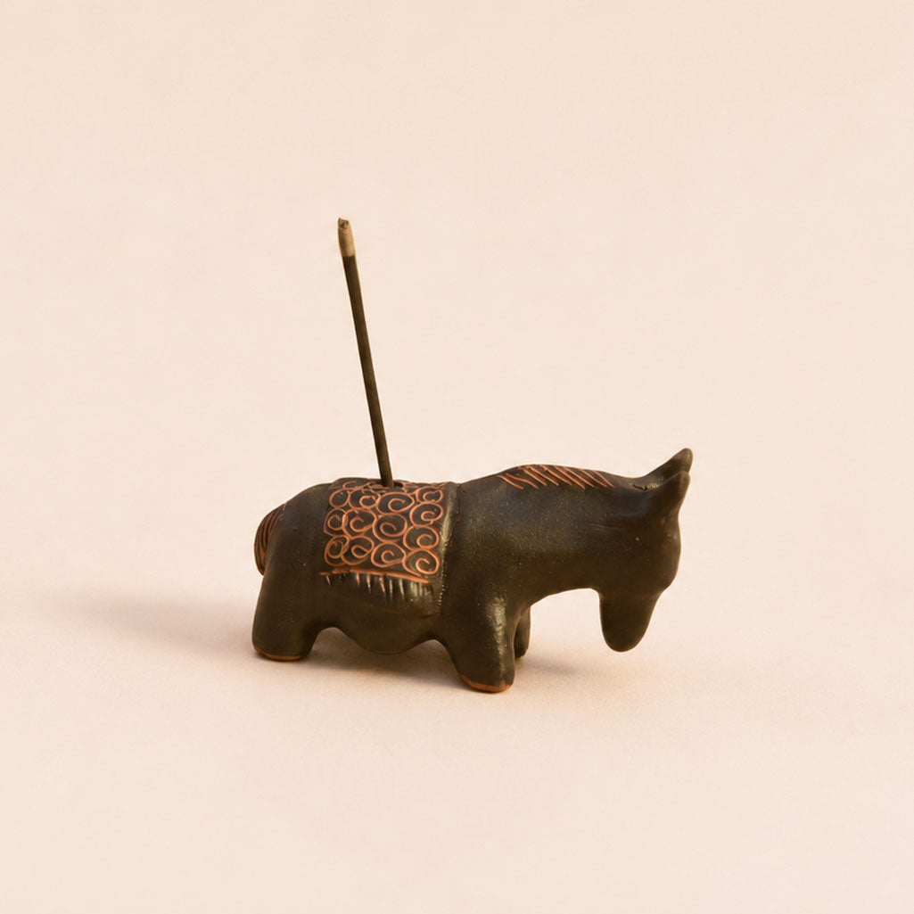 Handcrafted ceramic donkey incense holder