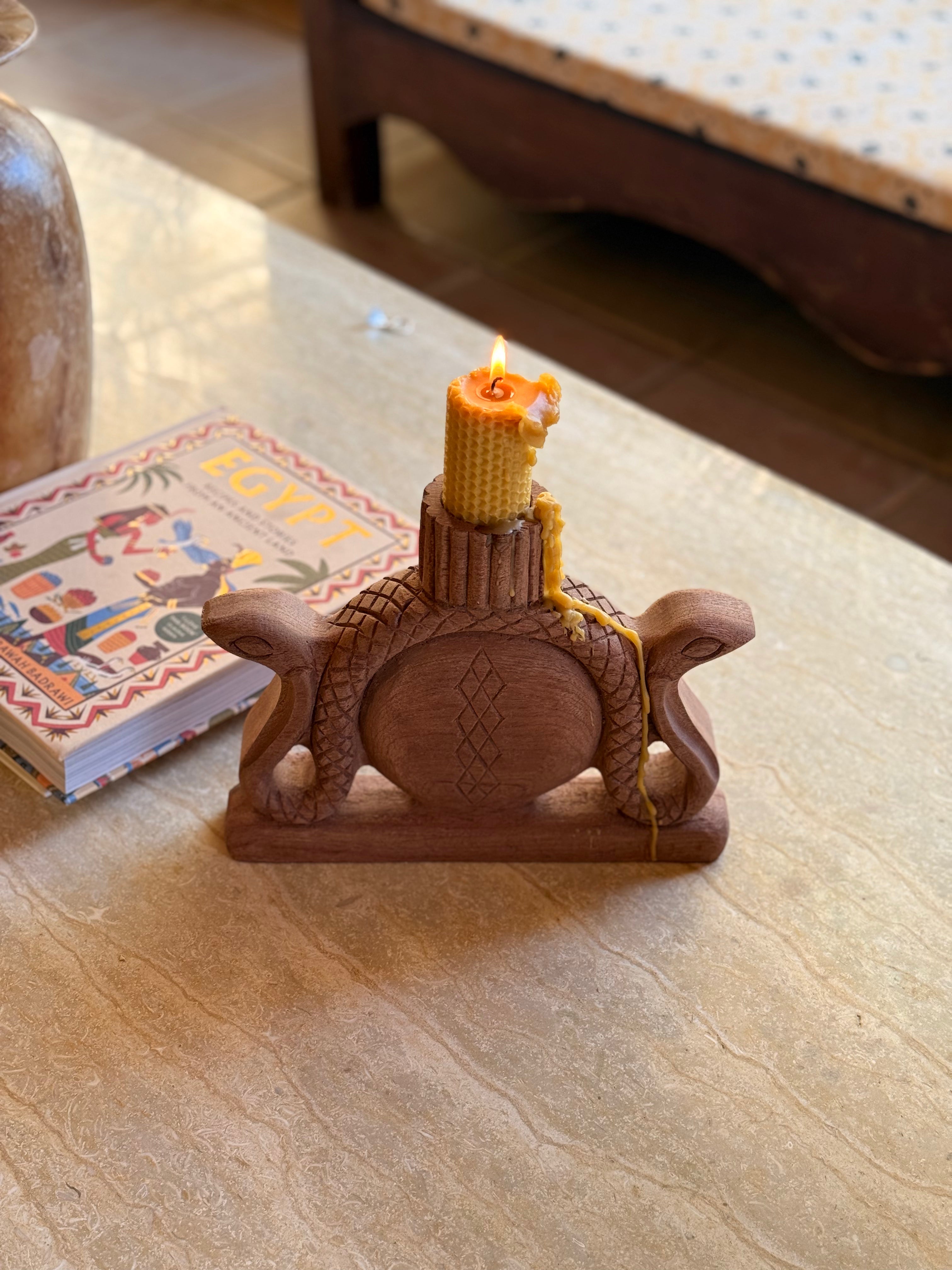 Hand-carved mahogany wood candle holder
