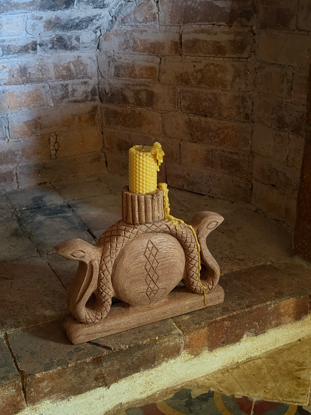 Hand-carved mahogany wood candle holder